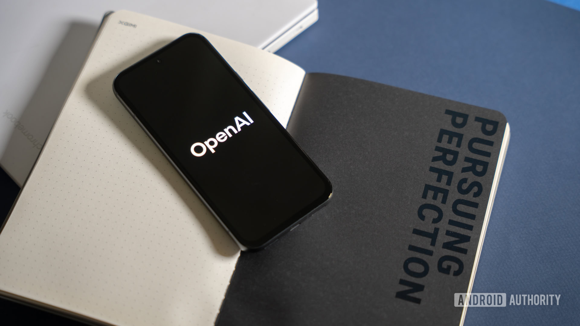 Open AI Chatgpt Logo On Phone Stock Photo